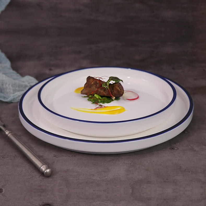 Hotel porcelain plate with blue rim detail