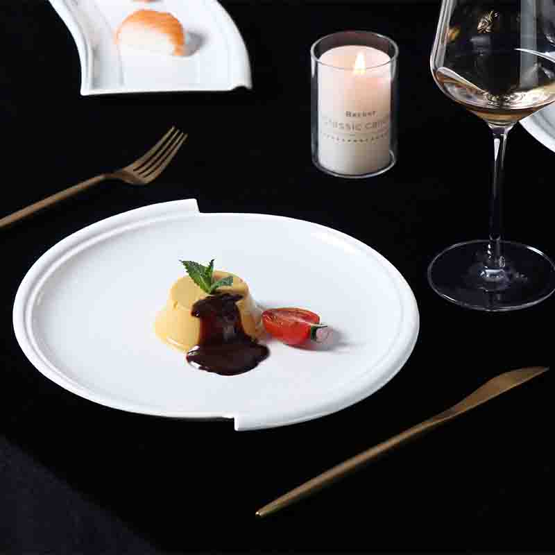 Modern white porcelain serving plate with irregular organic shape