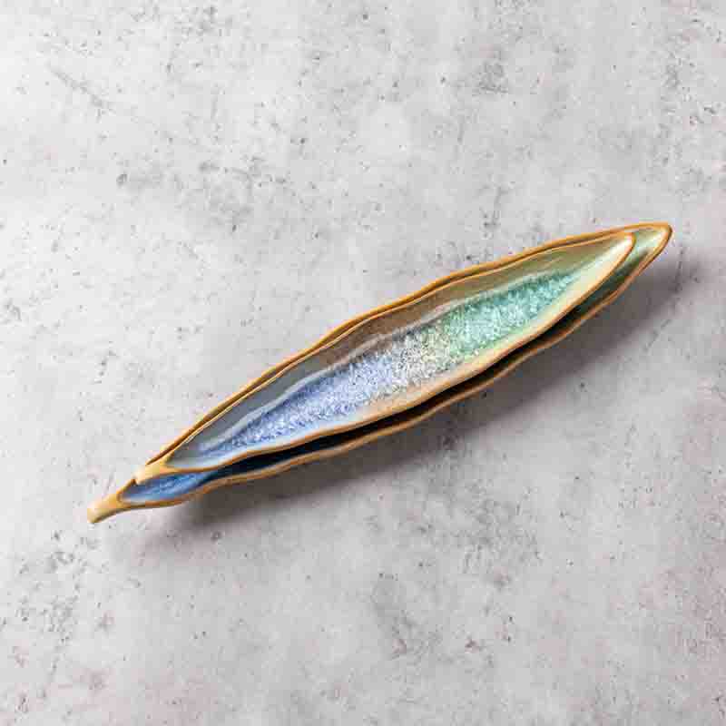 Ergonomic boat-shaped porcelain plate for modern fusion dishes wholesale from a premium porcelain dinnerware manufacturer