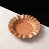 Premium matching set of ceramic tableware displayed on a wooden table for one-stop commercial supply